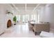 Dining room features a fireplace, built-in cabinets, and a banquette with seating at 70 Finch Forest Trl, Atlanta, GA 30327