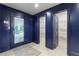 Hallway with two doors and a view of a porch with chairs at 70 Finch Forest Trl, Atlanta, GA 30327