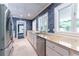 Kitchen with stainless steel appliances, granite countertops and bright light from the exterior at 70 Finch Forest Trl, Atlanta, GA 30327