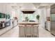 Spacious kitchen with a center island, stainless steel appliances, and a bay window at 70 Finch Forest Trl, Atlanta, GA 30327