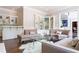 Relaxing living room featuring built-in shelving, a wet bar, and comfortable seating at 70 Finch Forest Trl, Atlanta, GA 30327