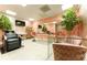 Charming salon with modern chairs, glass desks, large mirror and a pink flower wall at 70 Finch Forest Trl, Atlanta, GA 30327