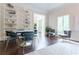 Bright sitting area with natural light, stylish chairs, and built-in bookshelves at 70 Finch Forest Trl, Atlanta, GA 30327
