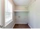 Laundry room with shelves and window at 10 Briarcliff Pl, Stockbridge, GA 30281