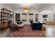 Comfortable living room with plush seating, hardwood floors, natural light and shelving at 120 Nezhat Pl, Sandy Springs, GA 30350