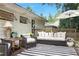 Cozy backyard deck with stylish furniture, an umbrella for shade, and garden views at 3357 Pretty Branch Se Dr, Smyrna, GA 30080