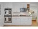 Well-appointed kitchen featuring stainless steel appliances and white cabinetry at 3357 Pretty Branch Se Dr, Smyrna, GA 30080