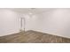 Spacious bedroom with hardwood floors and neutral walls at 580 Silver Moon Dr, Loganville, GA 30052