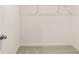 Walk-in closet with neutral carpet, white walls, and wire shelving at 580 Silver Moon Dr, Loganville, GA 30052