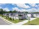 View of new construction home with a well-manicured lawn and sidewalks at 580 Silver Moon Dr, Loganville, GA 30052