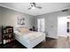 Cozy bedroom featuring hardwood floors, white trim and a ceiling fan at 955 Juniper Ne St # 3331, Atlanta, GA 30309