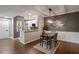 Dining room with stylish light fixture and easy access to kitchen featuring stainless steel appliances at 955 Juniper Ne St # 3331, Atlanta, GA 30309