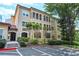 Charming condo building with well-maintained landscaping and assigned parking spaces for residents at 955 Juniper Ne St # 3331, Atlanta, GA 30309