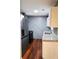 Modern kitchen featuring stainless steel appliances and granite countertops at 115 Bond Dr, Ellenwood, GA 30294