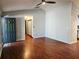 Open living area with hardwood floors, neutral walls, and a welcoming entrance at 115 Bond Dr, Ellenwood, GA 30294