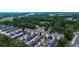 Serene aerial view of townhomes surrounded by verdant trees, creating a private atmosphere at 5357 Beaver Br, Norcross, GA 30071