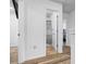 This is a bathroom with a walk in shower and wood look floors at 5357 Beaver Br, Norcross, GA 30071