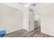 Empty bedroom features laminate flooring and neutral walls at 5357 Beaver Br, Norcross, GA 30071