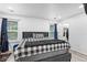 Comfortable bedroom with natural light, walk-in closet, and wood-look flooring at 5357 Beaver Br, Norcross, GA 30071