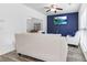 Bright living room with a decorative blue accent wall and natural light at 5357 Beaver Br, Norcross, GA 30071