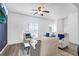 Bright living room with comfortable seating and a modern ceiling fan at 5357 Beaver Br, Norcross, GA 30071