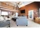 Spacious living room featuring a fireplace, vaulted ceiling, and a second-story balcony at 212 Warrenton Dr, Douglasville, GA 30134