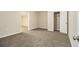 Cozy bedroom with soft carpet, closet, and ample natural light at 2120 Glenwood Downs Dr, Decatur, GA 30035