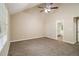Spacious bedroom featuring vaulted ceilings, plush carpet and a large window offering natural light at 2120 Glenwood Downs Dr, Decatur, GA 30035
