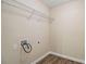 Dedicated laundry room with wood-look flooring and utility hookups at 2120 Glenwood Downs Dr, Decatur, GA 30035