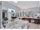 Large bathroom with a jacuzzi tub, large vanity with dual sinks and windows at 5121 Hunters Hill Sw Cv, Lilburn, GA 30047