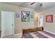 Bedroom with carpet floors, ceiling fan, and closet at 8240 Hurakan Creek Xing, Cumming, GA 30028