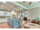 Spacious kitchen with a large center island and stainless steel appliances at 8240 Hurakan Creek Xing, Cumming, GA 30028