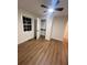 Cozy bedroom featuring hardwood floors, a ceiling fan, and a closet at 1227 Kenilworth Dr, Atlanta, GA 30310