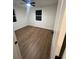 Bright bedroom with hardwood floors and a ceiling fan at 1227 Kenilworth Dr, Atlanta, GA 30310