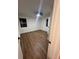 Bedroom featuring hardwood floors, white walls, and well-lit by natural light at 1227 Kenilworth Dr, Atlanta, GA 30310