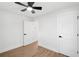Bedroom with hardwood floors, a ceiling fan, and an open doorway at 1227 Kenilworth Dr, Atlanta, GA 30310