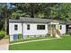 Attractive home exterior with a well-maintained lawn and neat landscaping at 1227 Kenilworth Dr, Atlanta, GA 30310