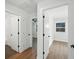 Hallway with doors leading to bedrooms and bathrooms at 1227 Kenilworth Dr, Atlanta, GA 30310