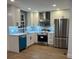 Bright kitchen featuring white cabinets, stainless steel appliances and granite countertops at 1227 Kenilworth Dr, Atlanta, GA 30310
