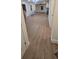 Bright living room with luxury vinyl flooring, recessed lights and fresh paint at 1227 Kenilworth Dr, Atlanta, GA 30310