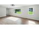 Open-concept living area with a hardwood flooring, and natural light at 1227 Kenilworth Dr, Atlanta, GA 30310