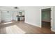 Open-concept living area with a kitchen and hardwood flooring at 1227 Kenilworth Dr, Atlanta, GA 30310