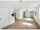 Open-concept living area with a stainless steel appliances and hardwood flooring at 1227 Kenilworth Dr, Atlanta, GA 30310