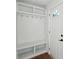 Bright mudroom with built-in storage bench and coat hooks at 1227 Kenilworth Dr, Atlanta, GA 30310
