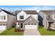 Charming two-story home with stone accents, a two-car garage, and freshly sodded front yard at 2690 Ravencliff Dr, Austell, GA 30168