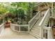 Exterior view showcasing a walkway and stairs leading to a bright, well-maintained house at 8480 Valemont Dr, Sandy Springs, GA 30350