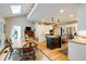 Bright kitchen with stainless steel appliances, granite countertops, eat in dining area, and a skylight at 8480 Valemont Dr, Sandy Springs, GA 30350