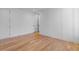 Bright bedroom featuring hardwood floors and neutral walls providing a blank canvas to customize at 915 Laurel Brooke Ave, Peachtree City, GA 30269