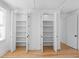 Spacious closet with open shelving provides ample storage at 915 Laurel Brooke Ave, Peachtree City, GA 30269