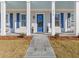 Inviting front porch with stone pathway, perfect for relaxing outdoors at 915 Laurel Brooke Ave, Peachtree City, GA 30269